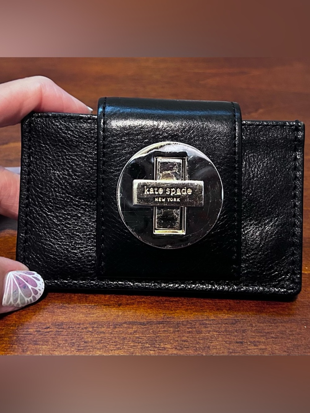 Kate Spade black pebbled leather turn lock card holder